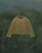 Moss Henley in muted green waffle knit, flatlay
