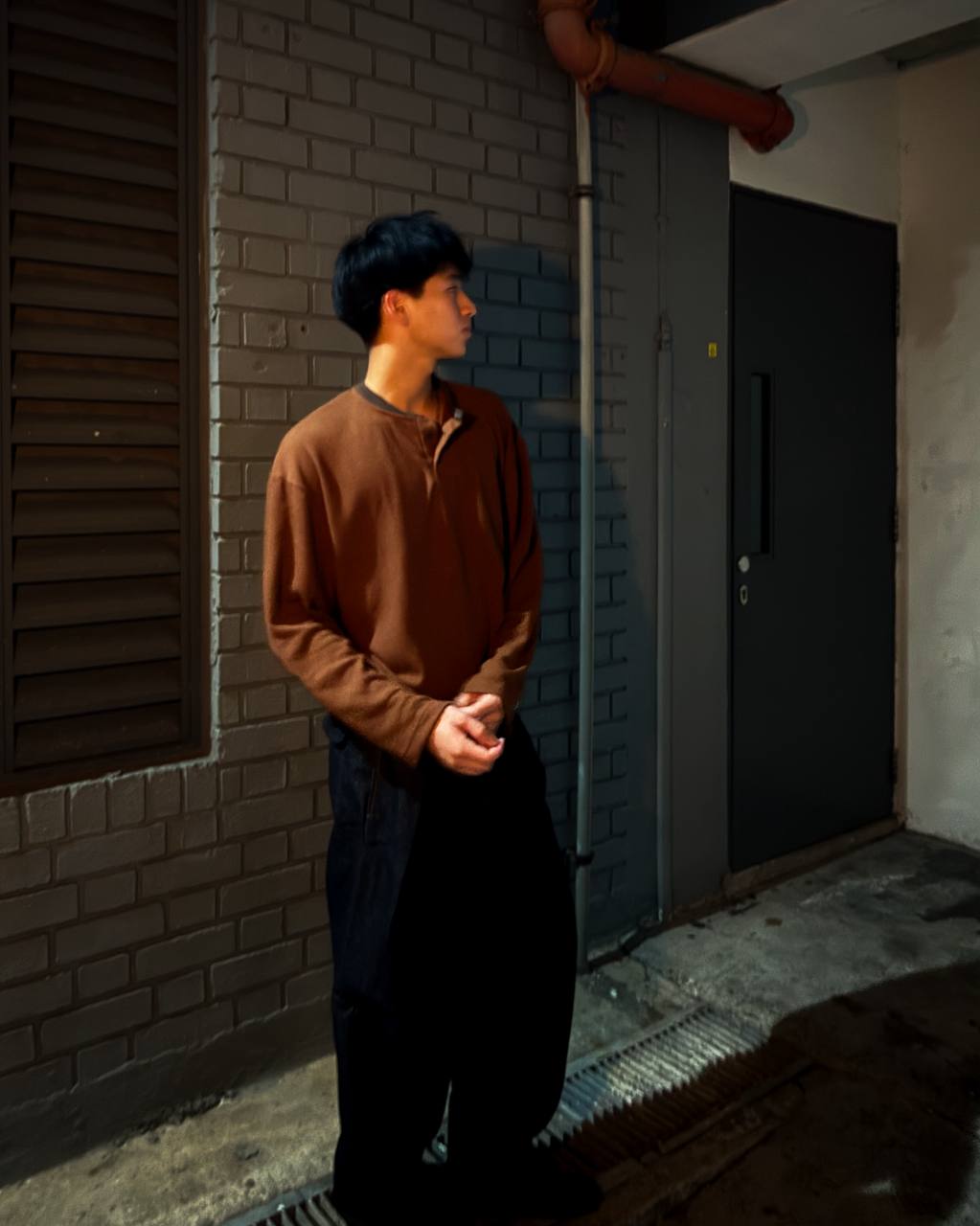 Box Henley Cedar worn on model — full length street shot
