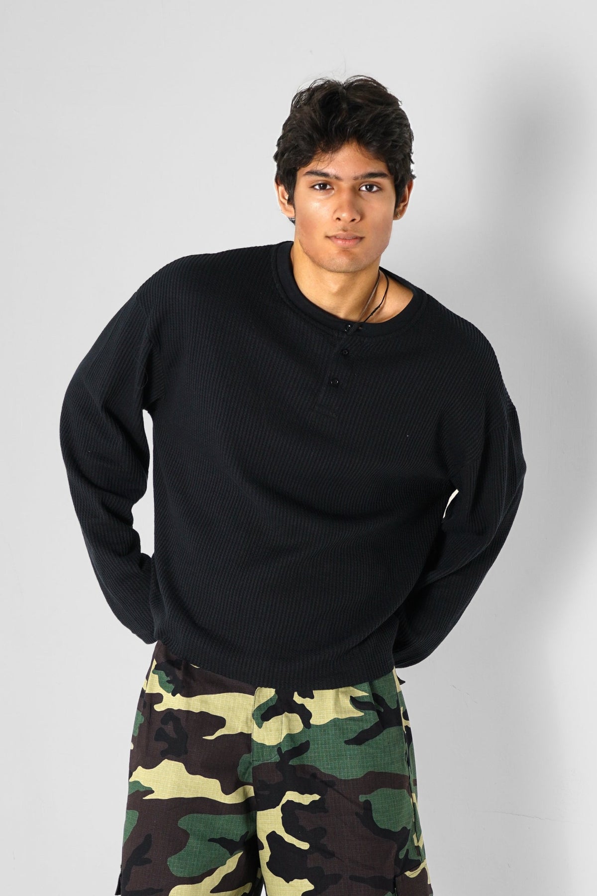 Aston Abode Box Henley in Charcoal, lifestyle shot on Aarav