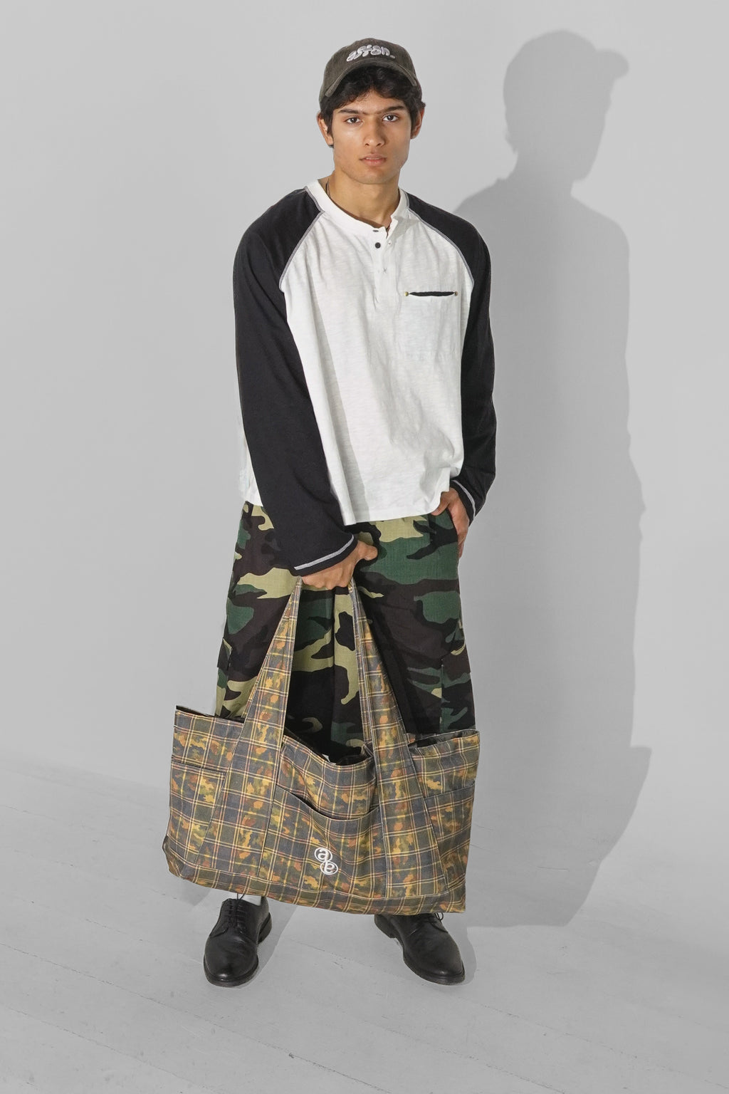 Aston Abode Double Shift Bag, lifestyle shot on Aarav