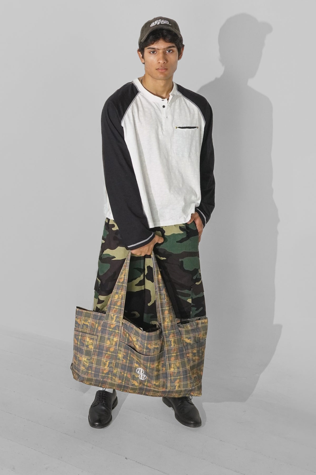 Aston Abode Double Shift Bag, lifestyle shot on Aarav