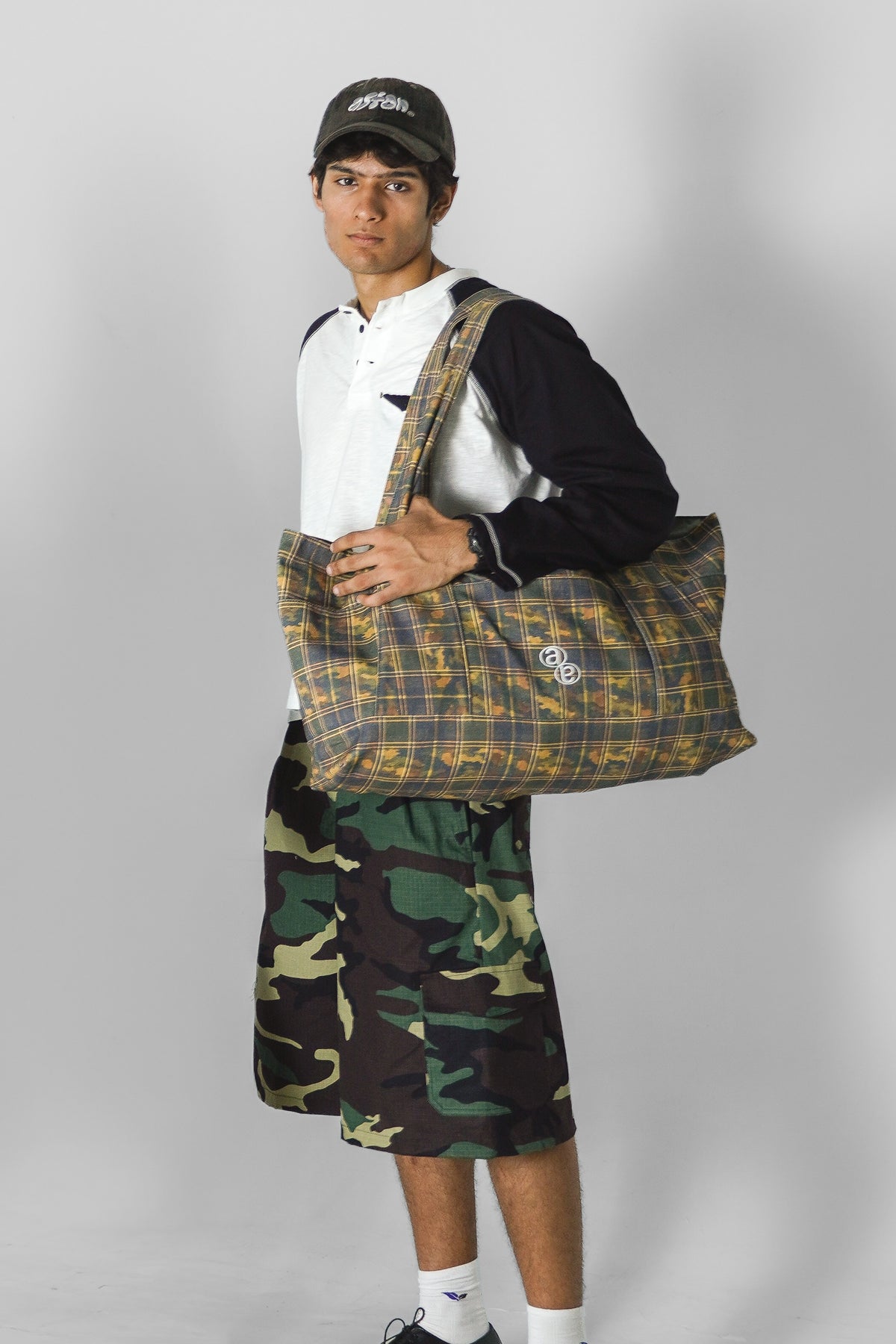 Aston Abode Double Shift Bag, lifestyle shot on Aarav
