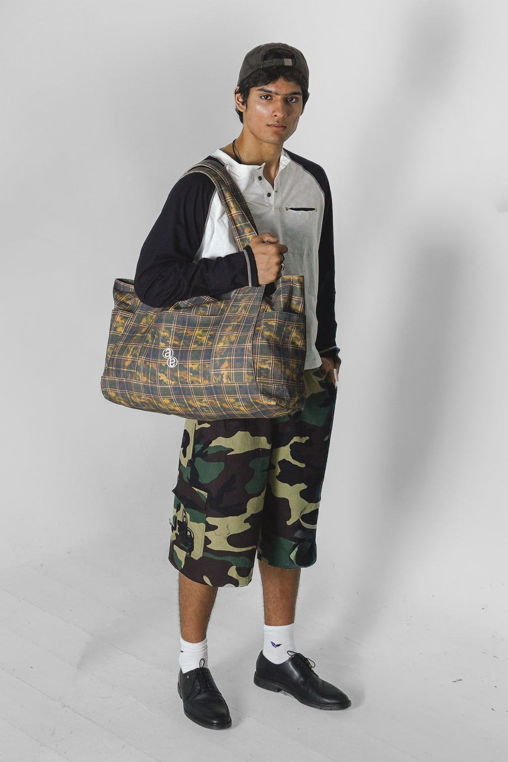 Aston Abode Double Shift Bag, lifestyle shot on Aarav