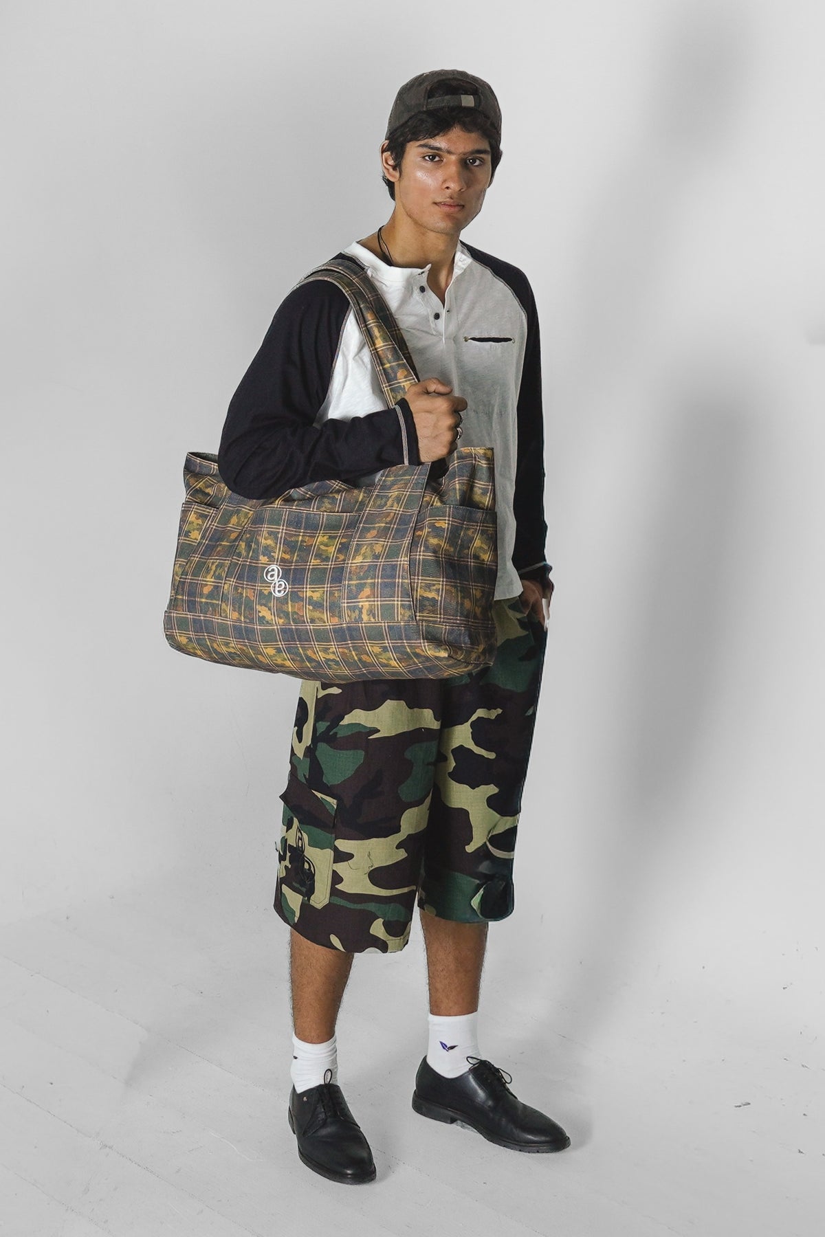 Aston Abode Double Shift Bag, lifestyle shot on Aarav