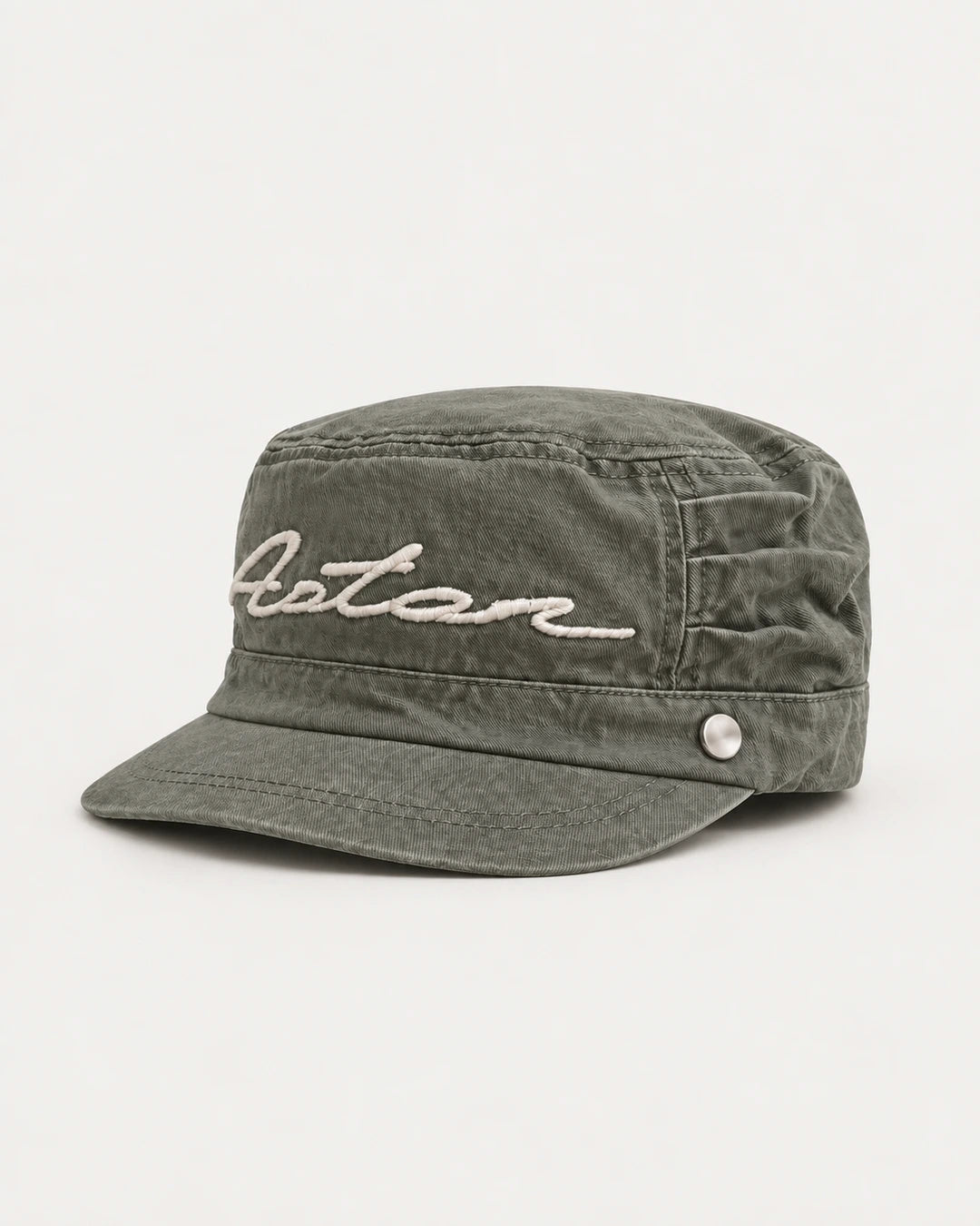 Field Kepi Cap three-quarter side view showing the brim and side stud