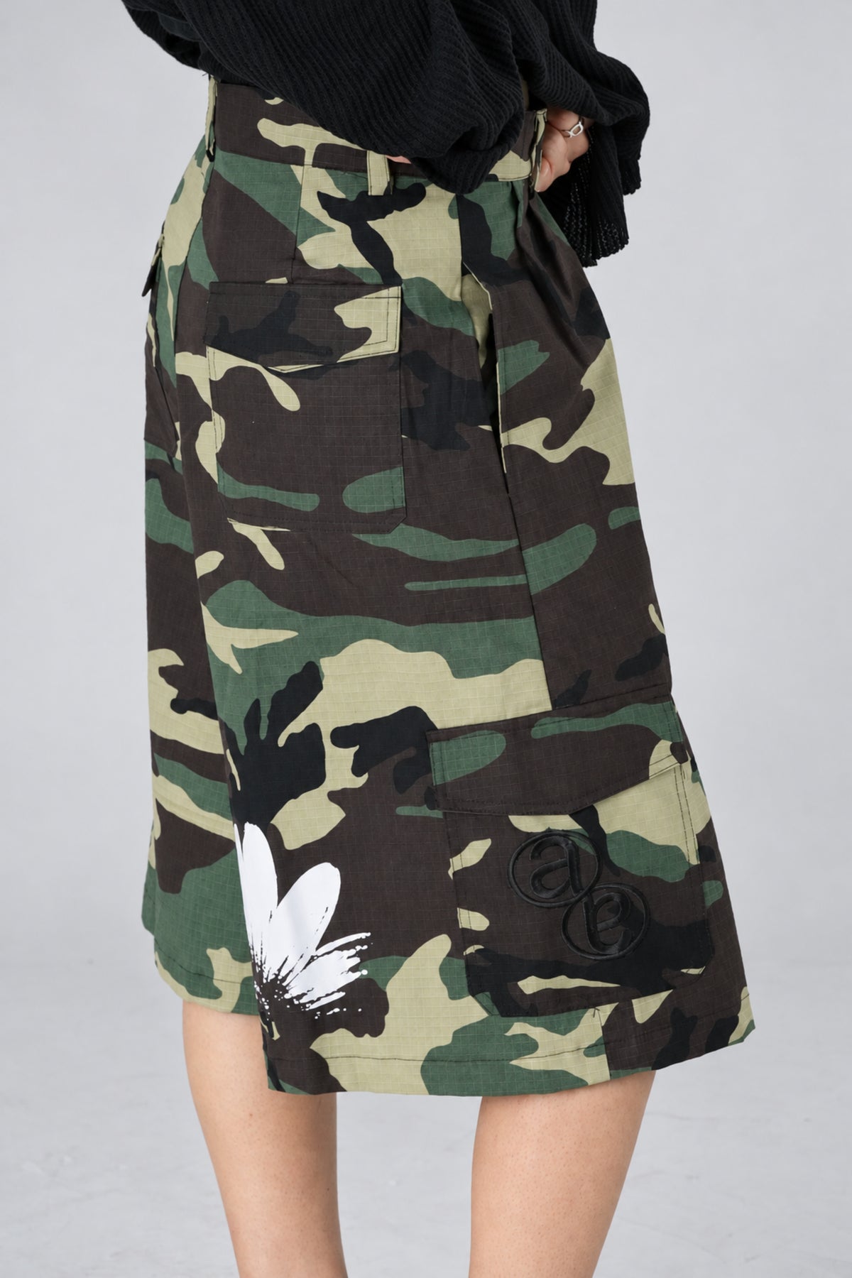 Aston Abode Lobby Shorts in Garden, lifestyle shot on Clarice