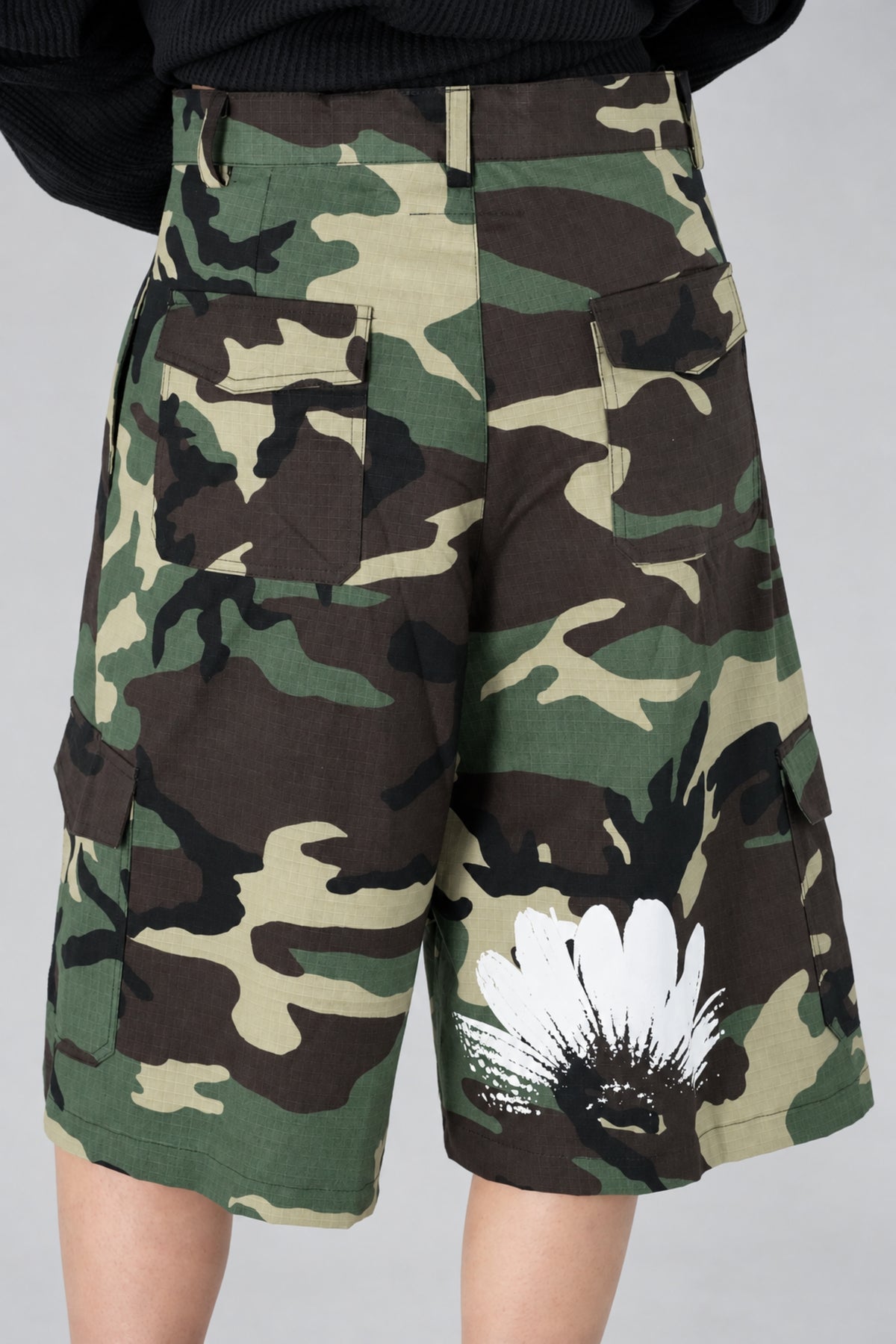 Aston Abode Lobby Shorts in Garden, lifestyle shot on Clarice