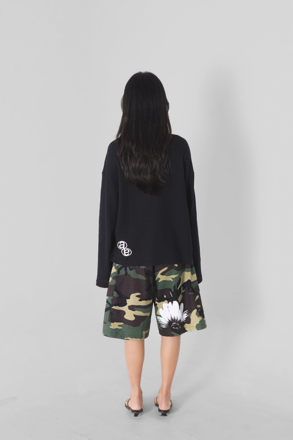 Aston Abode Lobby Shorts in Garden, lifestyle shot on Clarice