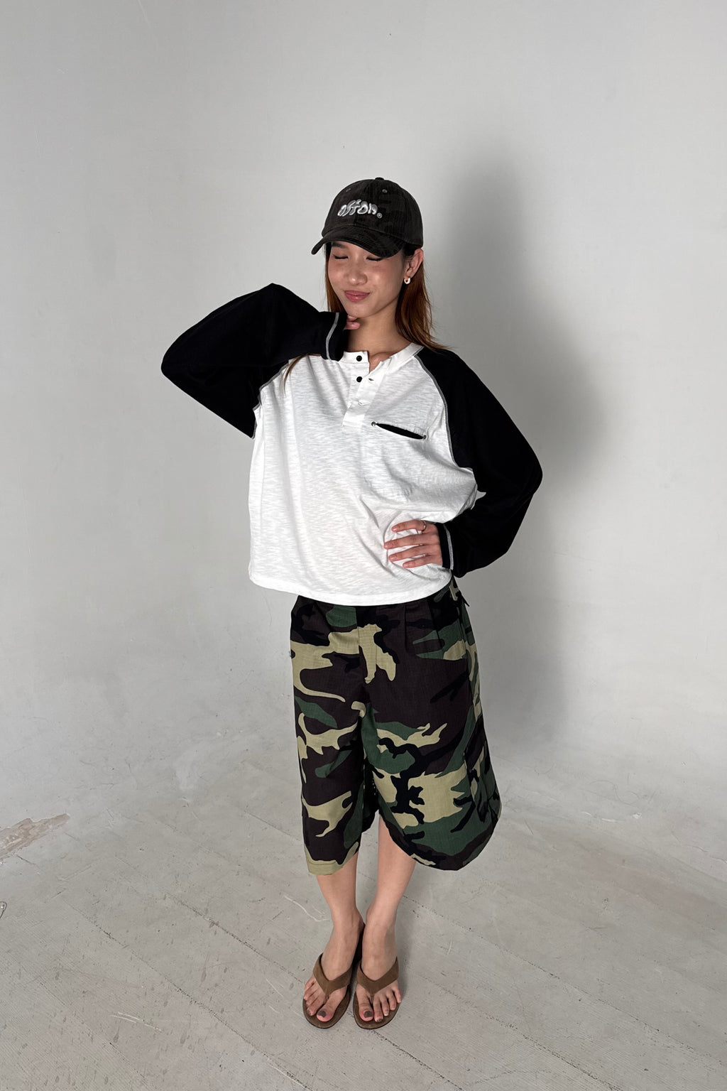 Aston Abode Lobby Shorts in Garden, lifestyle shot on Hera