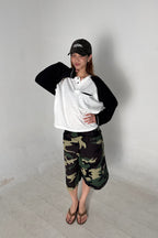 Aston Abode Lobby Shorts in Garden, lifestyle shot on Hera