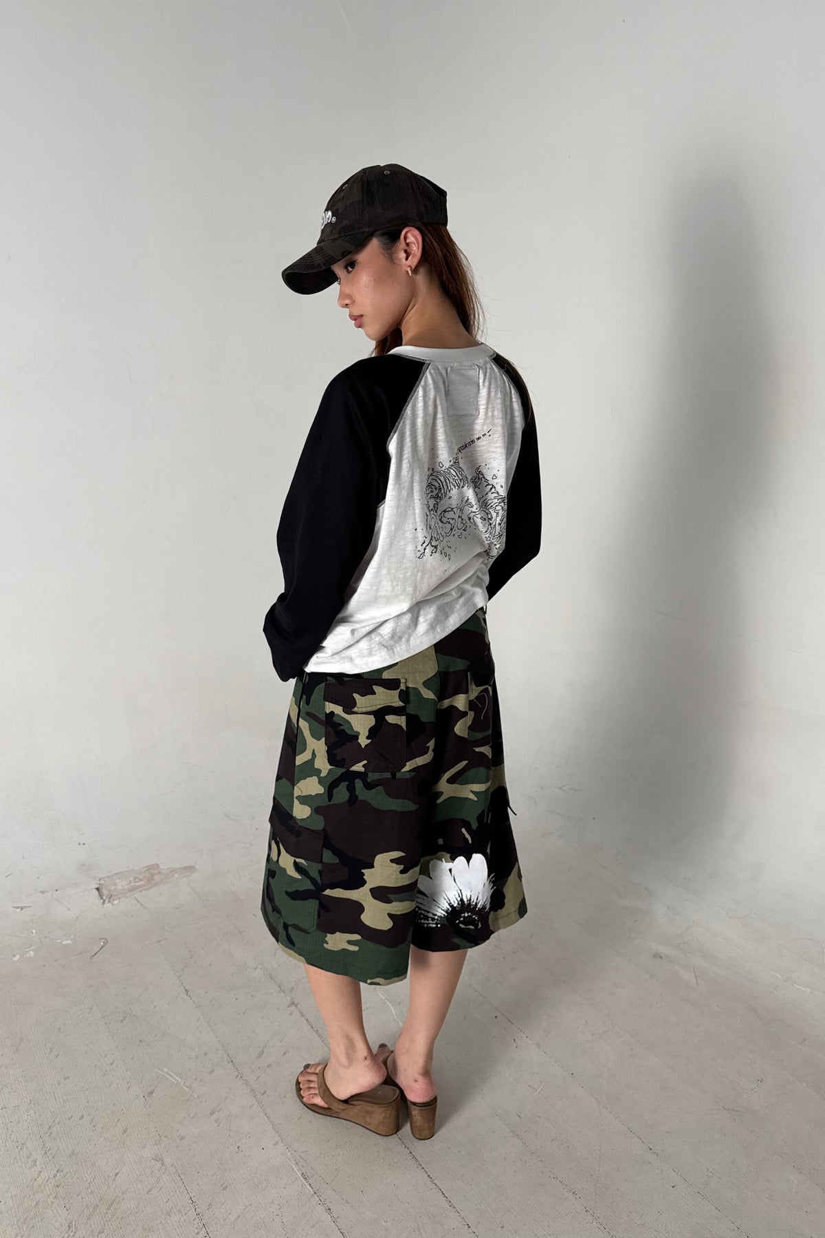 Aston Abode Lobby Shorts in Garden, lifestyle shot on Hera