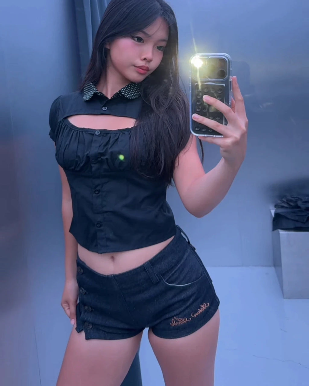Sidebar Microshorts worn on model with the Cupcake Blouse, showing the side button placket and gold script embroidery