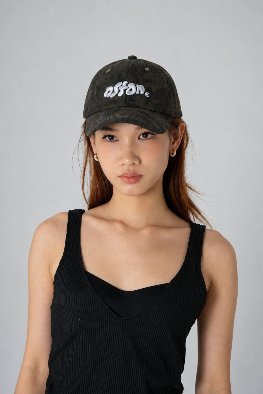 Aston Abode Staple Cap in Terrain, lifestyle shot on Hera