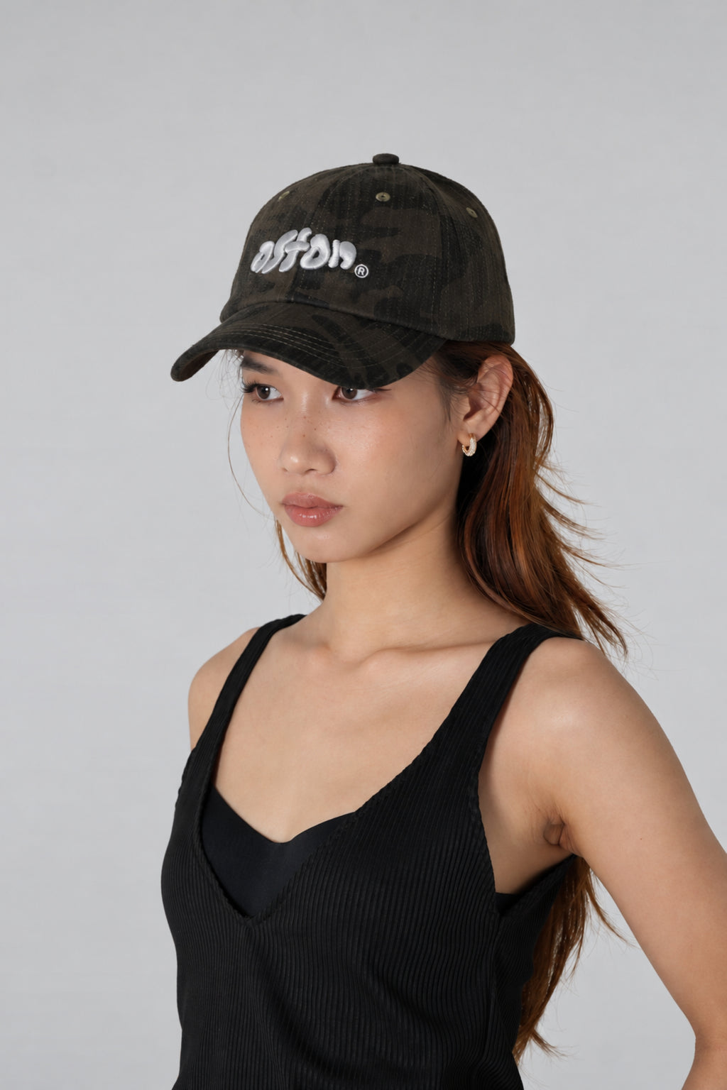 Aston Abode Staple Cap in Terrain, lifestyle shot on Hera