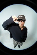 Aston Abode Staple Cap in Terrain, lifestyle shot on Aarav
