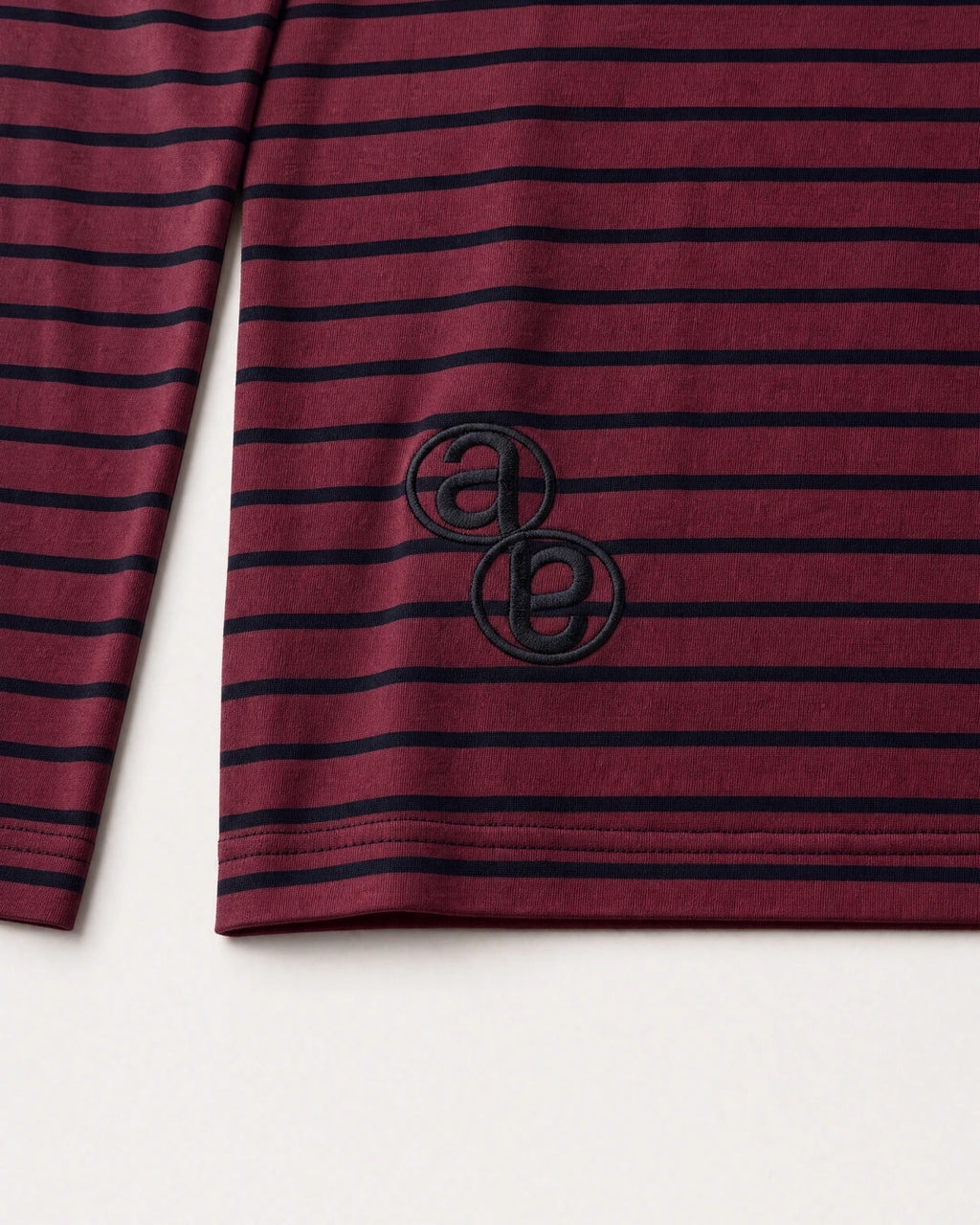 Wine Henley tonal AB monogram embroidery at the lower back