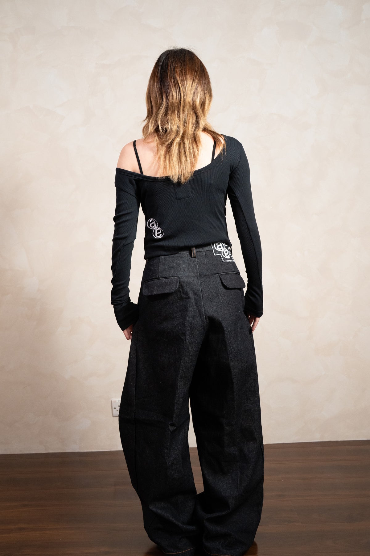 Aston Abode Backless Henley, back view, full length, on female model