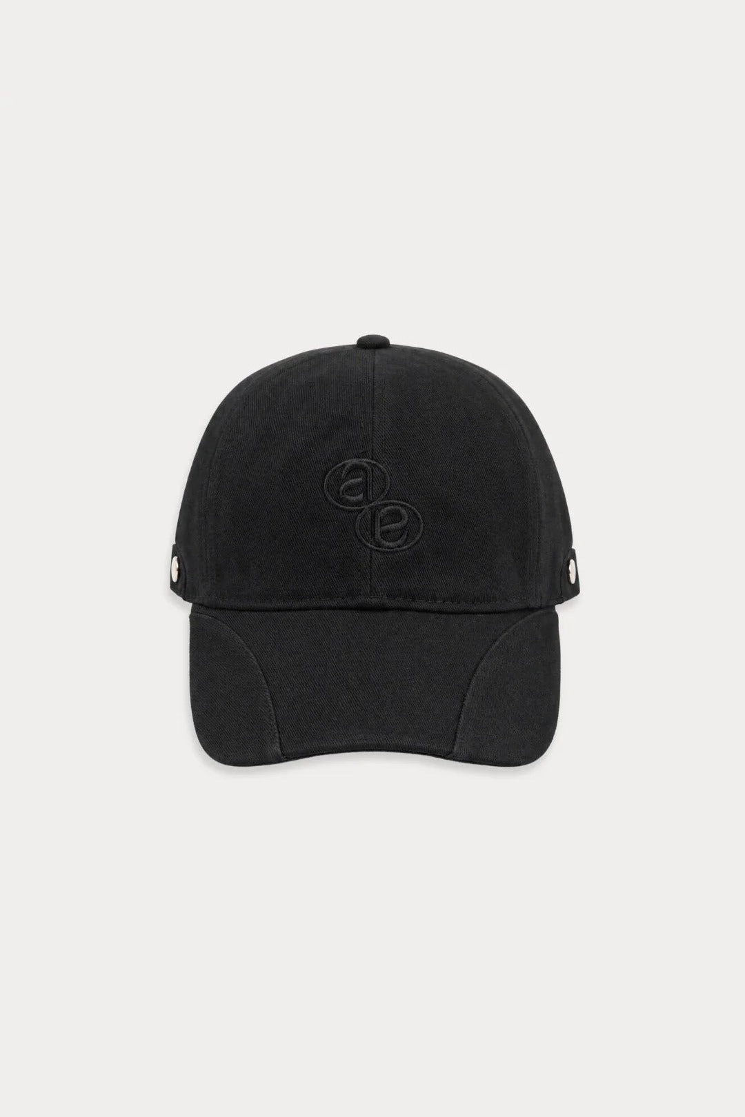 Aston Abode Banana Cap in Charcoal, front flat lay
