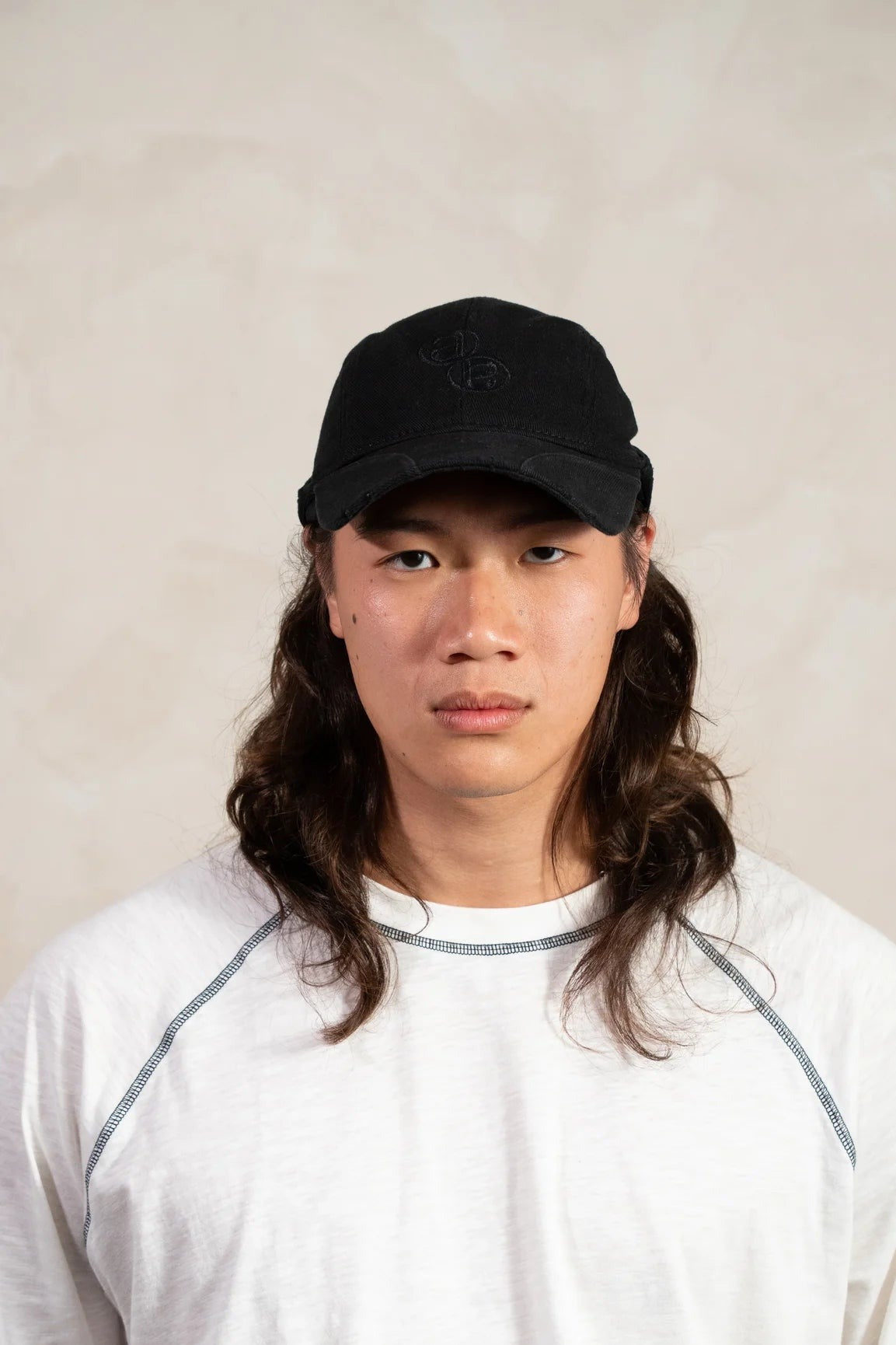 Aston Abode Banana Cap in Charcoal, front view, worn