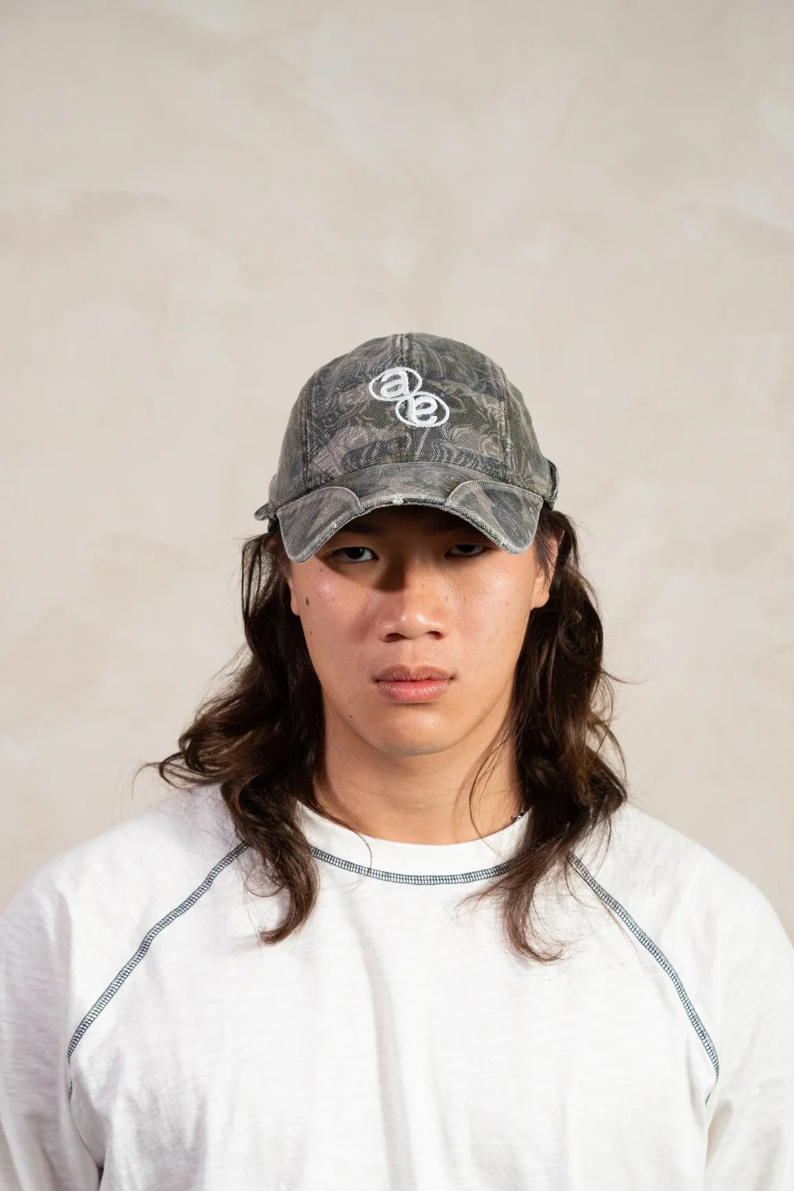 Aston Abode Banana Cap in Realtree, front view, worn