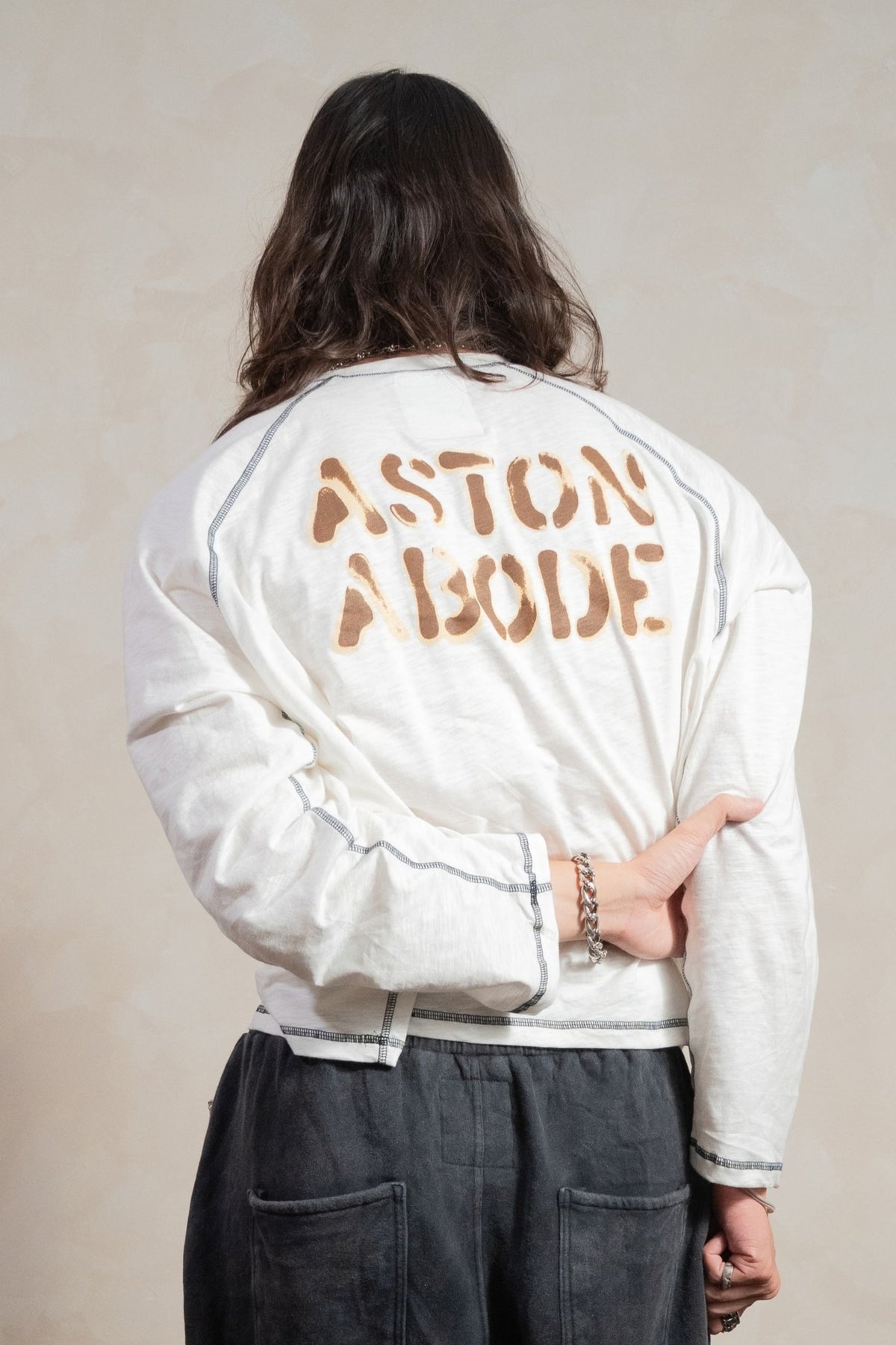 Aston Abode Scorched Raglan, back view, on male model