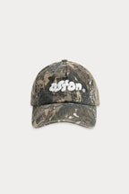 Aston Abode Staple Cap in Real Tree, front flat lay