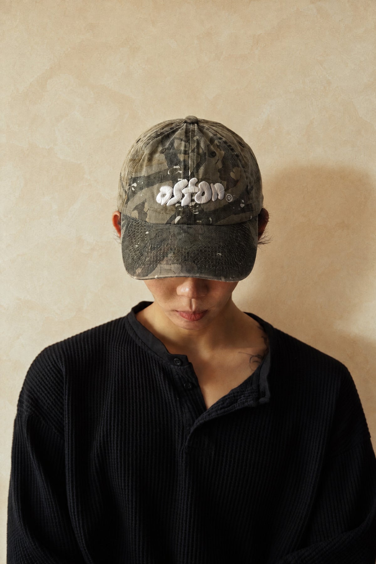 Aston Abode Staple Cap in Real Tree, front view, worn