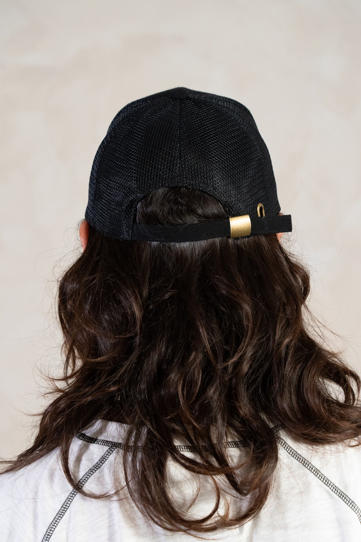 Aston Abode Trucker Cap, back view, worn