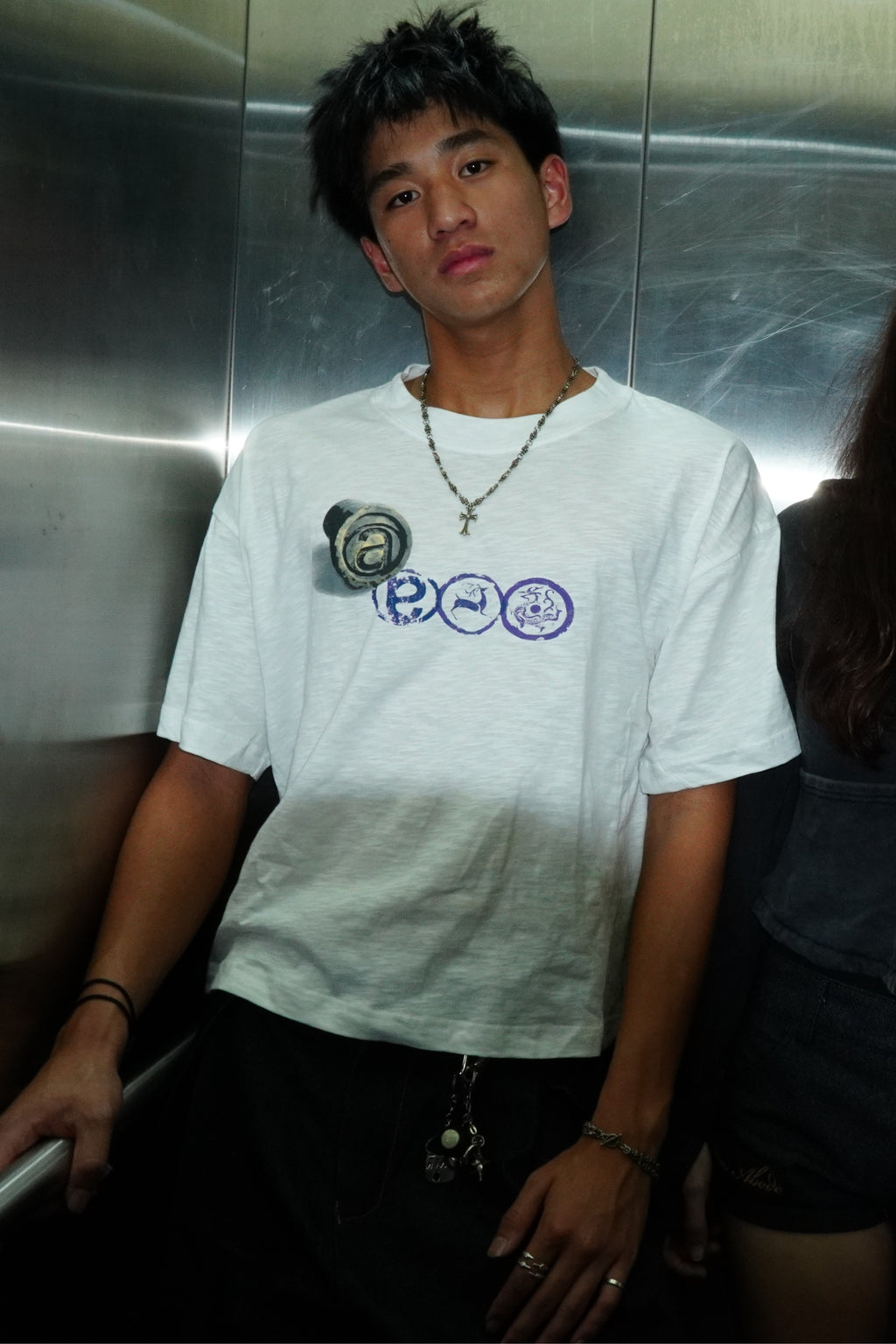 Aston Abode Wadang Tee, lifestyle shot on Asher